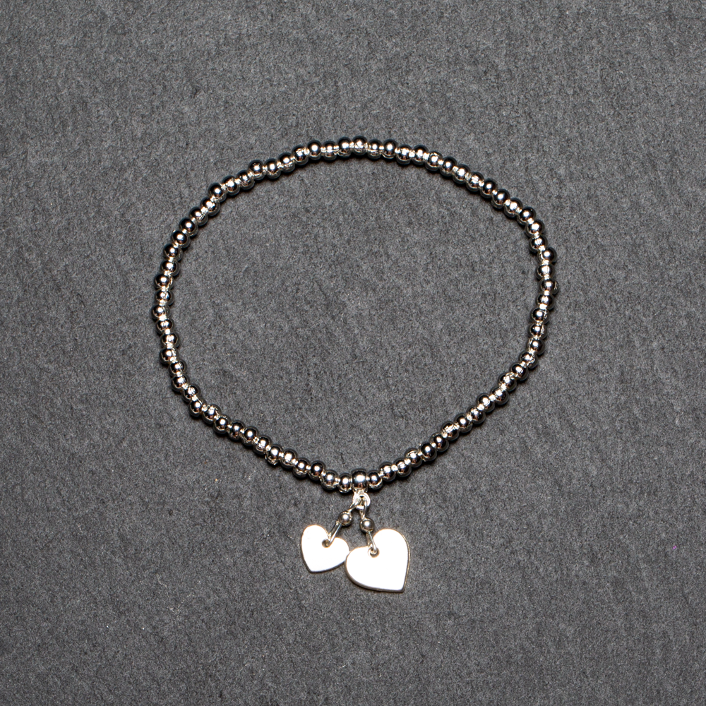 Heart Charm Bracelet In Silver Plate
