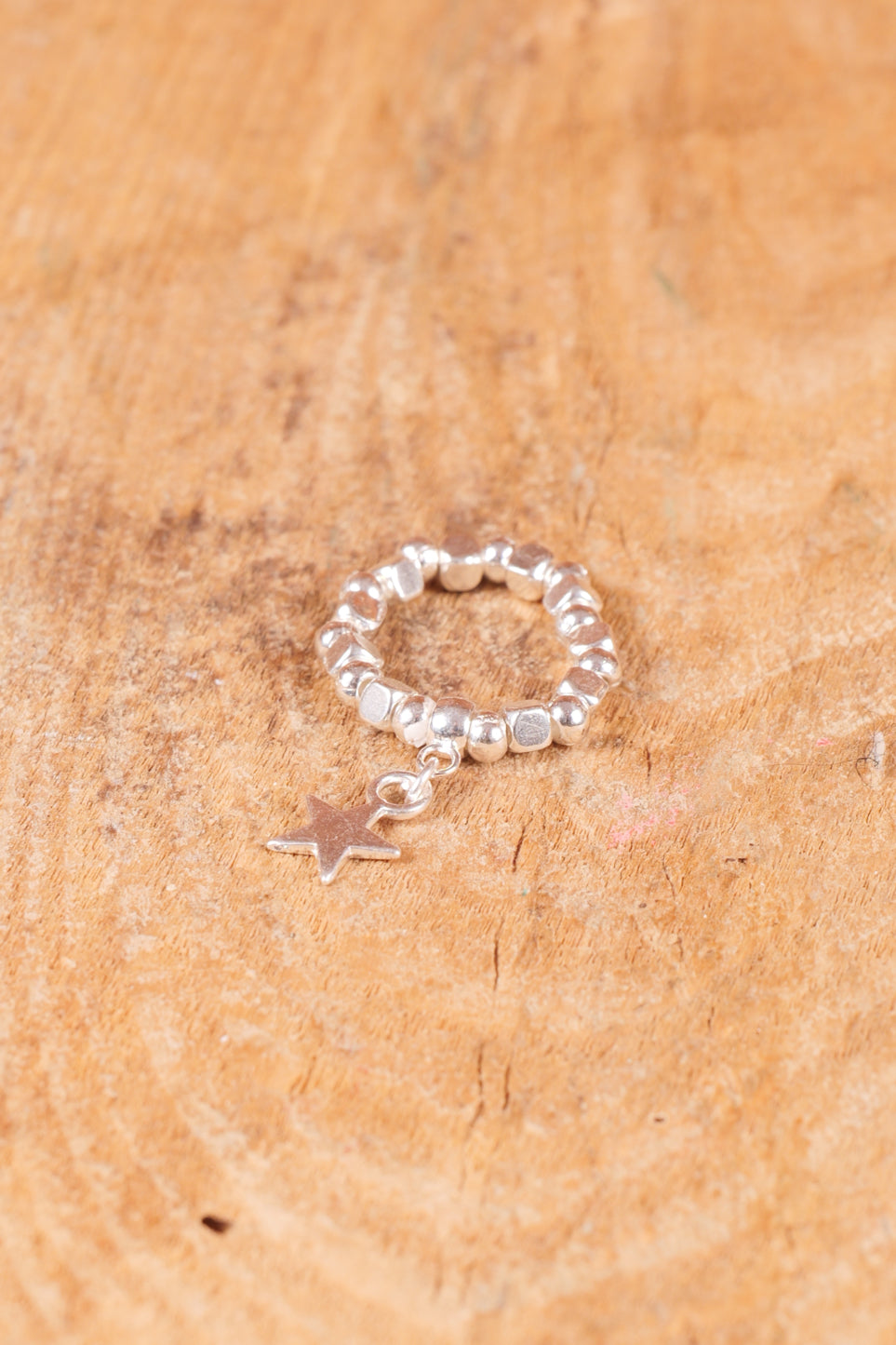 Elasticated Star Charm Ring In Silver Plate